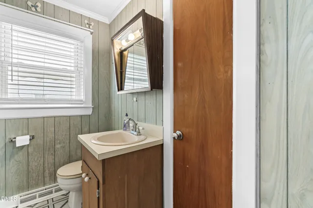 a bathroom with a sink and a toilet