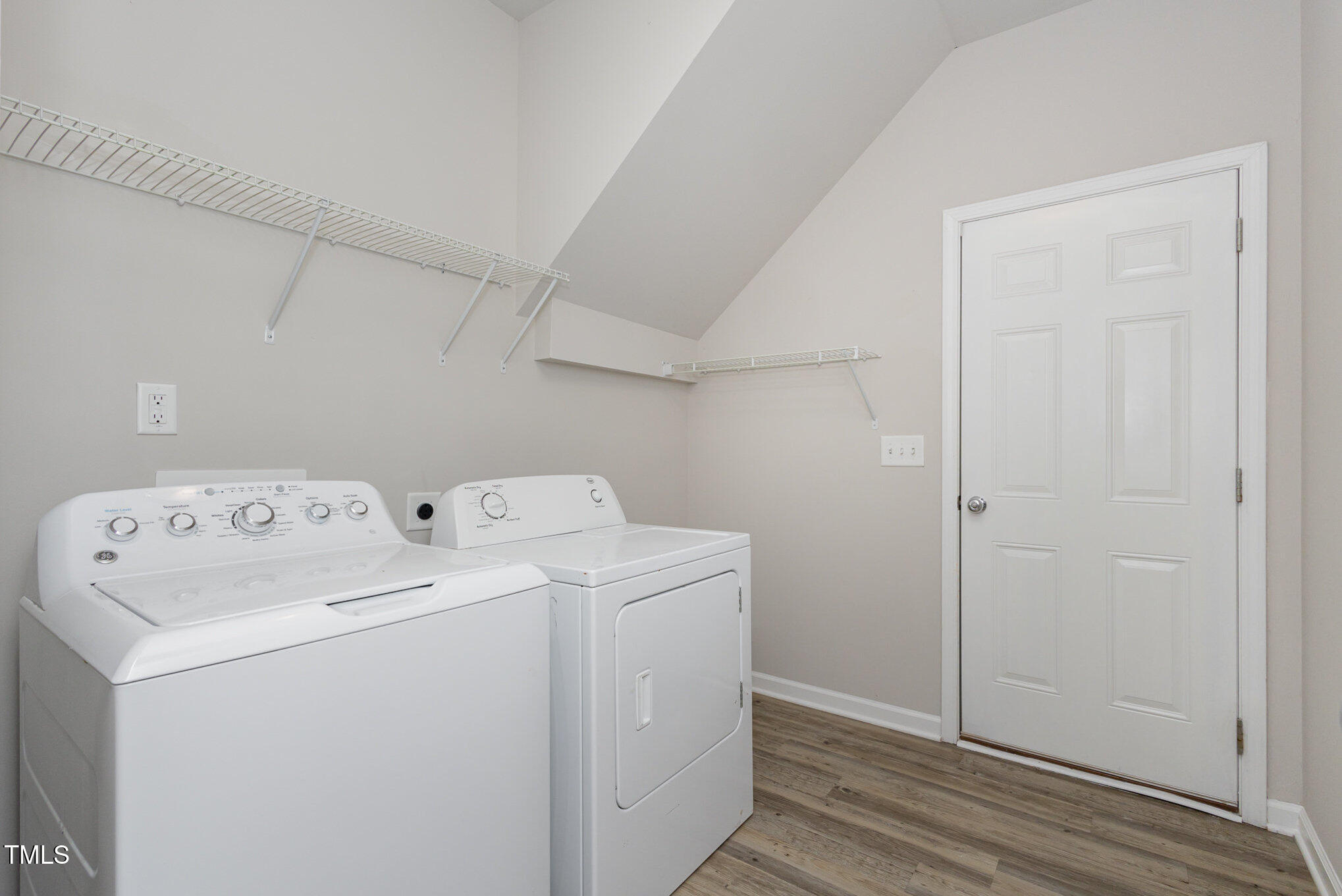 131 Kinnakeet Drive Durham, NC 27704 - Photo 7 of 18 a utility room with dryer and washer