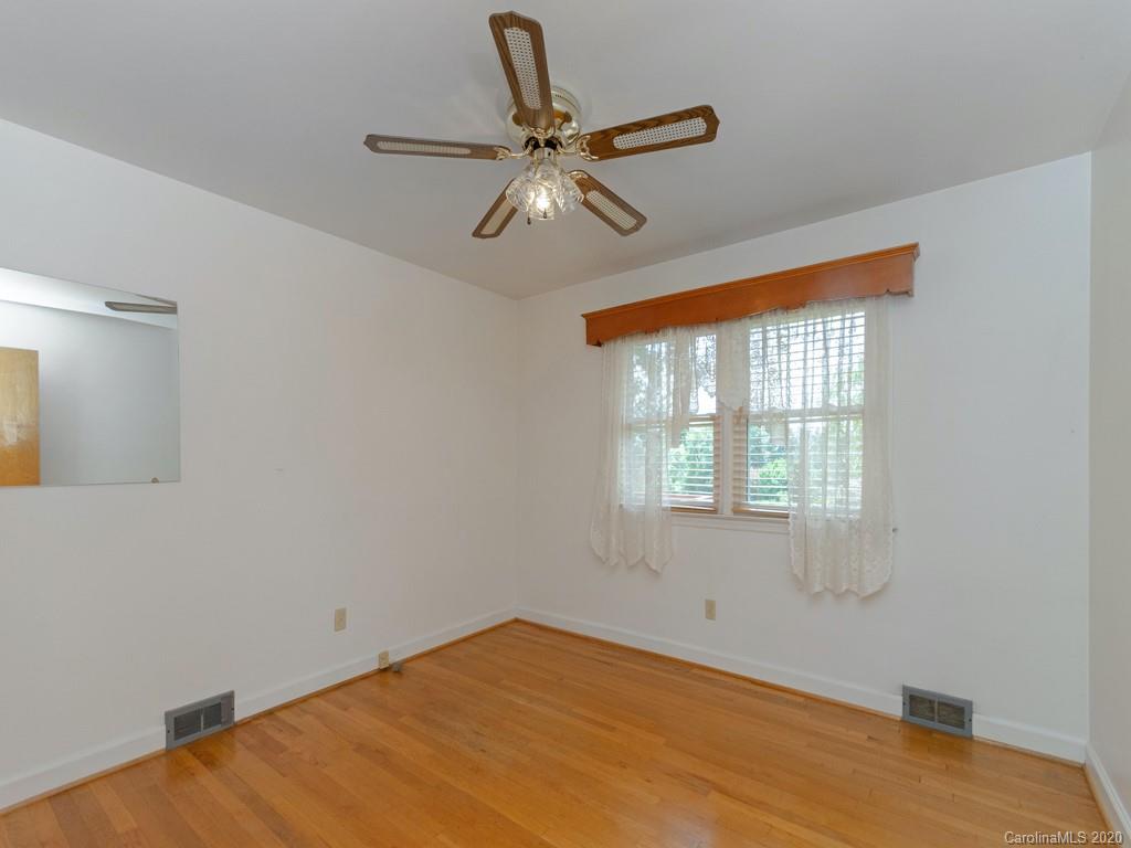 124 Trantham Road Canton, NC 28716 - Photo 10 of 18 a view of an empty room with a window
