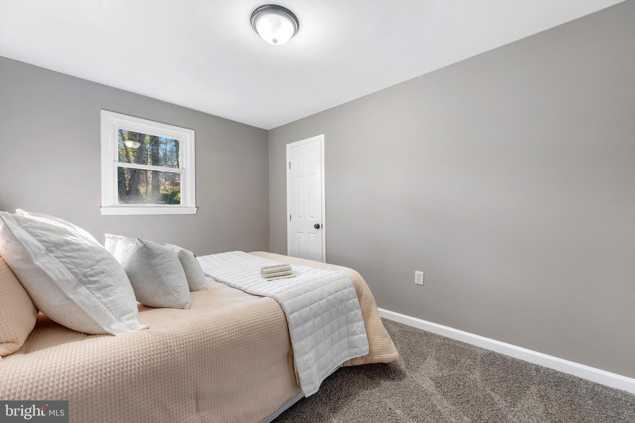 712 St Marys Road Pylesville, MD 21132 - Photo 12 of 43 a bedroom with a bed and window