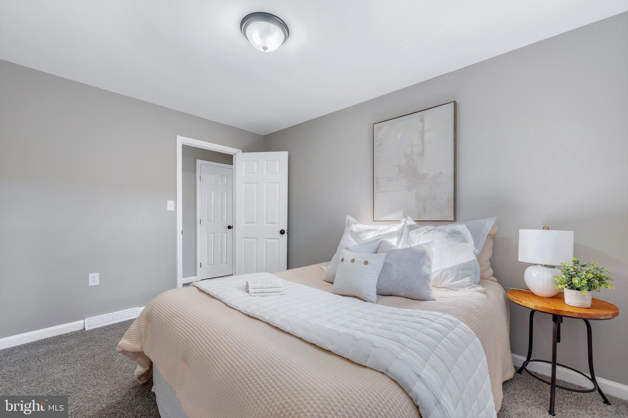 712 St Marys Road Pylesville, MD 21132 - Photo 14 of 43 a bedroom with a bed and chair