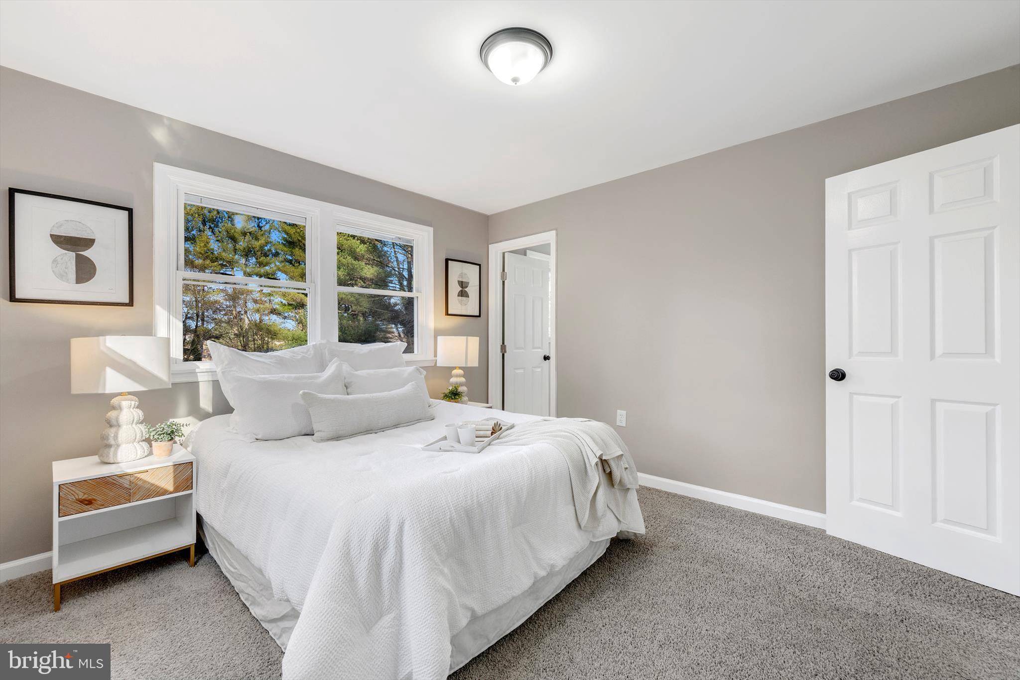 712 St Marys Road Pylesville, MD 21132 - Photo 19 of 43 a bedroom with a bed and a large window