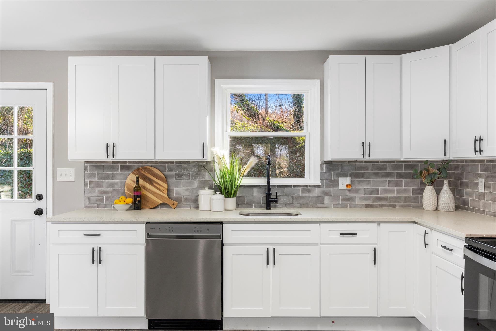 712 St Marys Road Pylesville, MD 21132 - Photo 4 of 43 a kitchen with stainless steel appliances white cabinets sink and a window