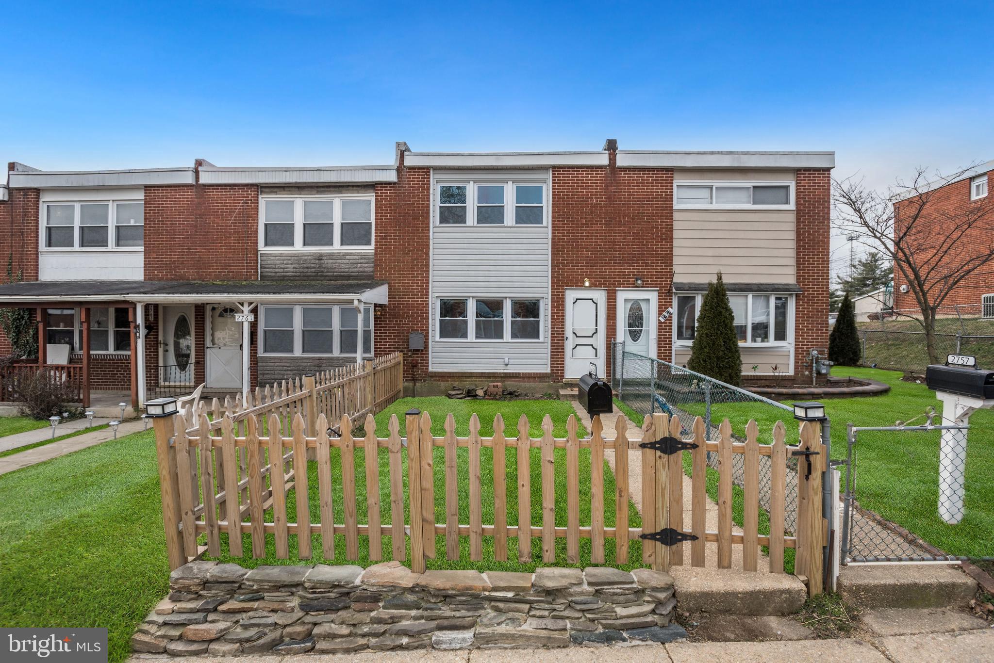 2759 Yarnall Road Baltimore, MD 21227 - Photo 1 of 21 a front view of a house with a yard