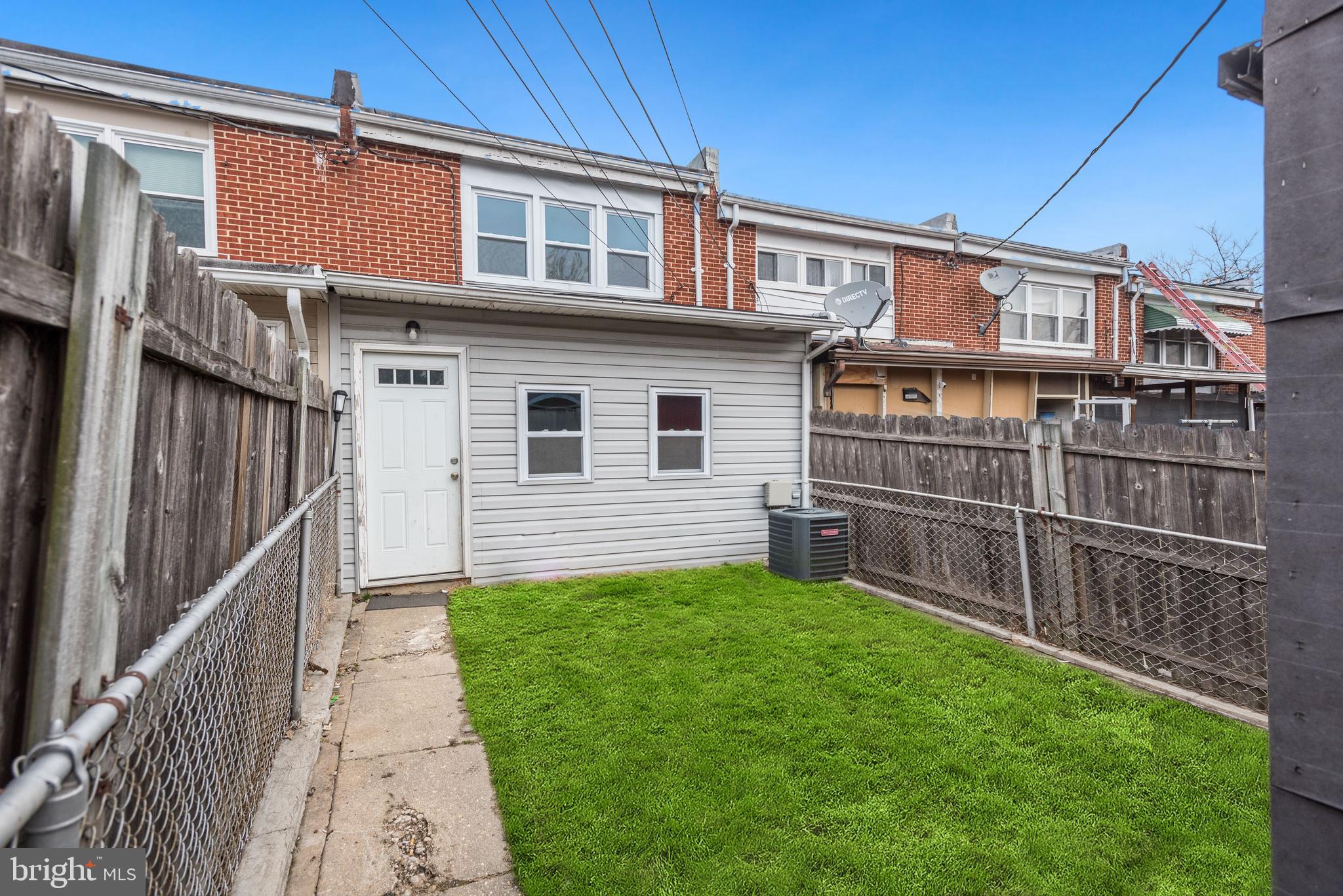 2759 Yarnall Road Baltimore, MD 21227 - Photo 16 of 21 a view of a house with a yard