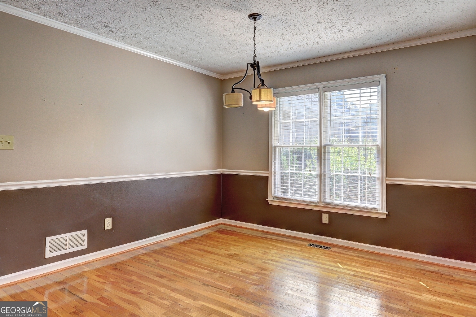 215 Laney Road McDonough, GA 30252 - Photo 13 of 38 a view of an empty room with a window