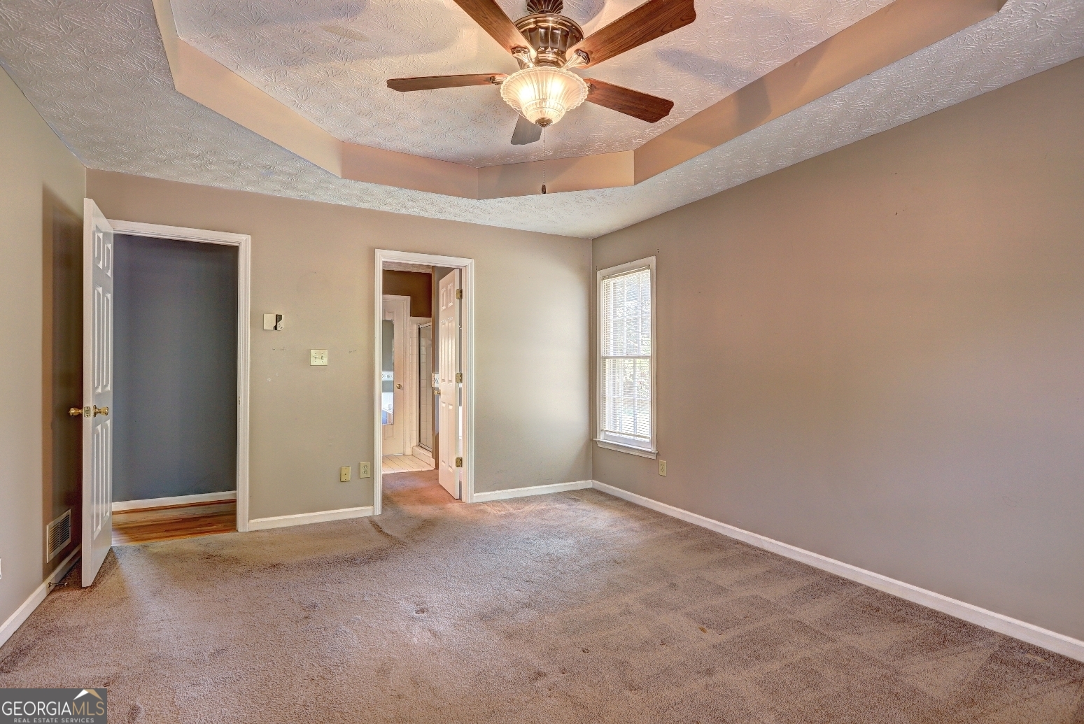 215 Laney Road McDonough, GA 30252 - Photo 16 of 38 a view of an empty room with a window