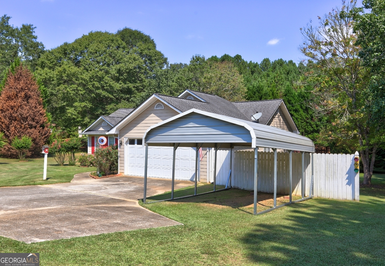 215 Laney Road McDonough, GA 30252 - Photo 37 of 38 a backyard of a house with table and chairs
