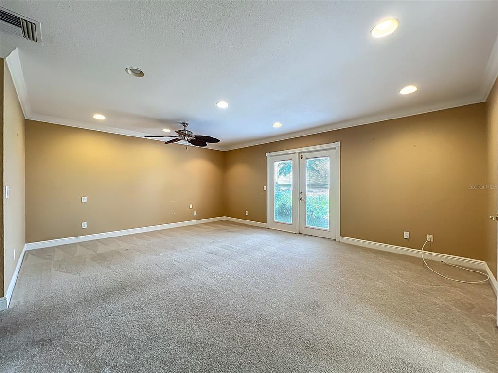 504 Banning Beach Road Tavares, FL 32778 - Photo 23 of 44 a view of an empty room with a window