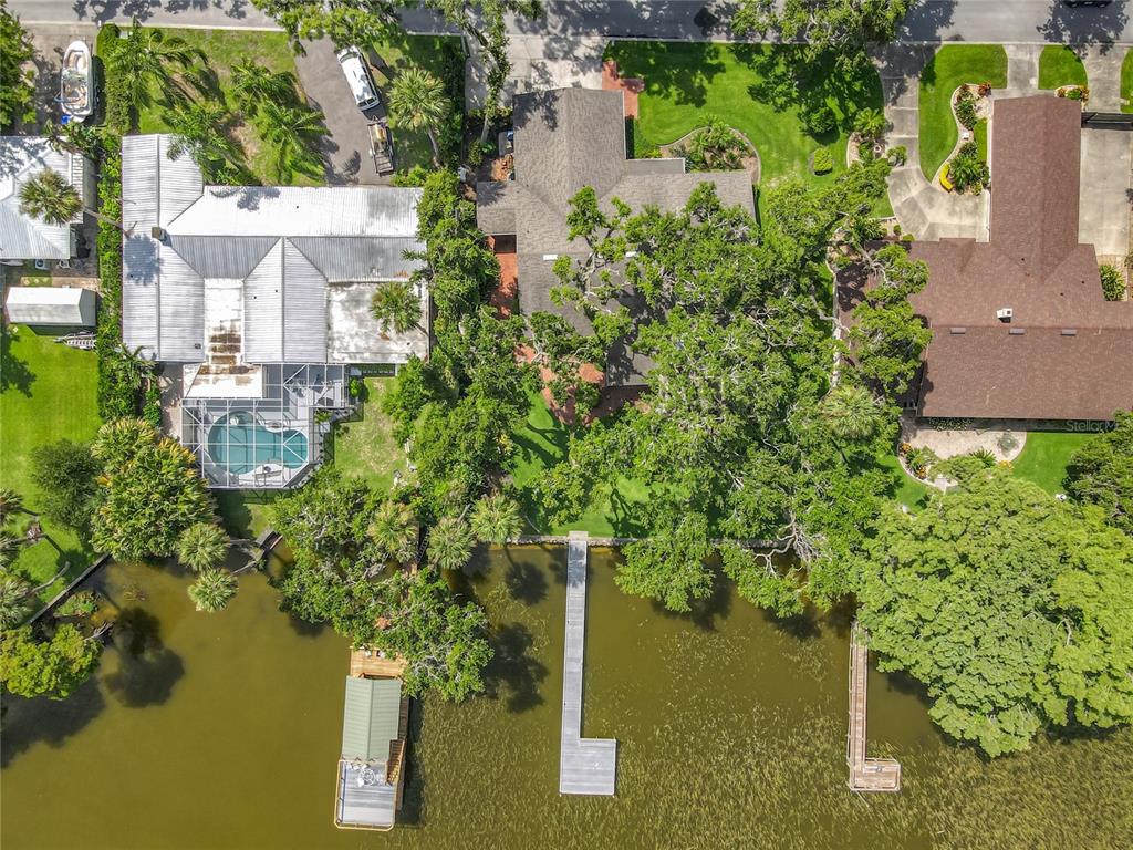 504 Banning Beach Road Tavares, FL 32778 - Photo 3 of 44 an aerial view of residential house with outdoor space and lake view