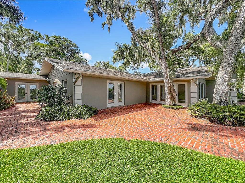 504 Banning Beach Road Tavares, FL 32778 - Photo 32 of 44 front view of a house with a yard