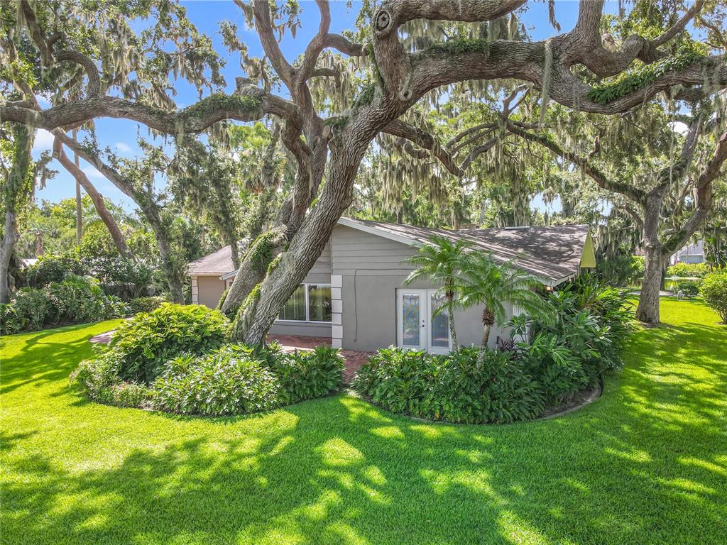 504 Banning Beach Road Tavares, FL 32778 - Photo 34 of 44 a house view with a garden space