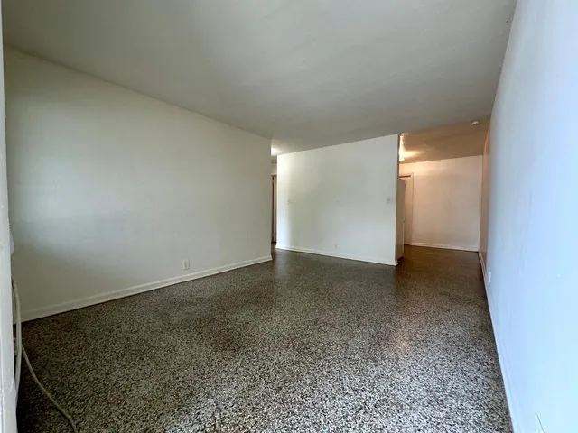 an empty room with a door