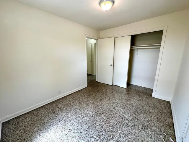 a bathroom with a sink a toilet and bathtub
