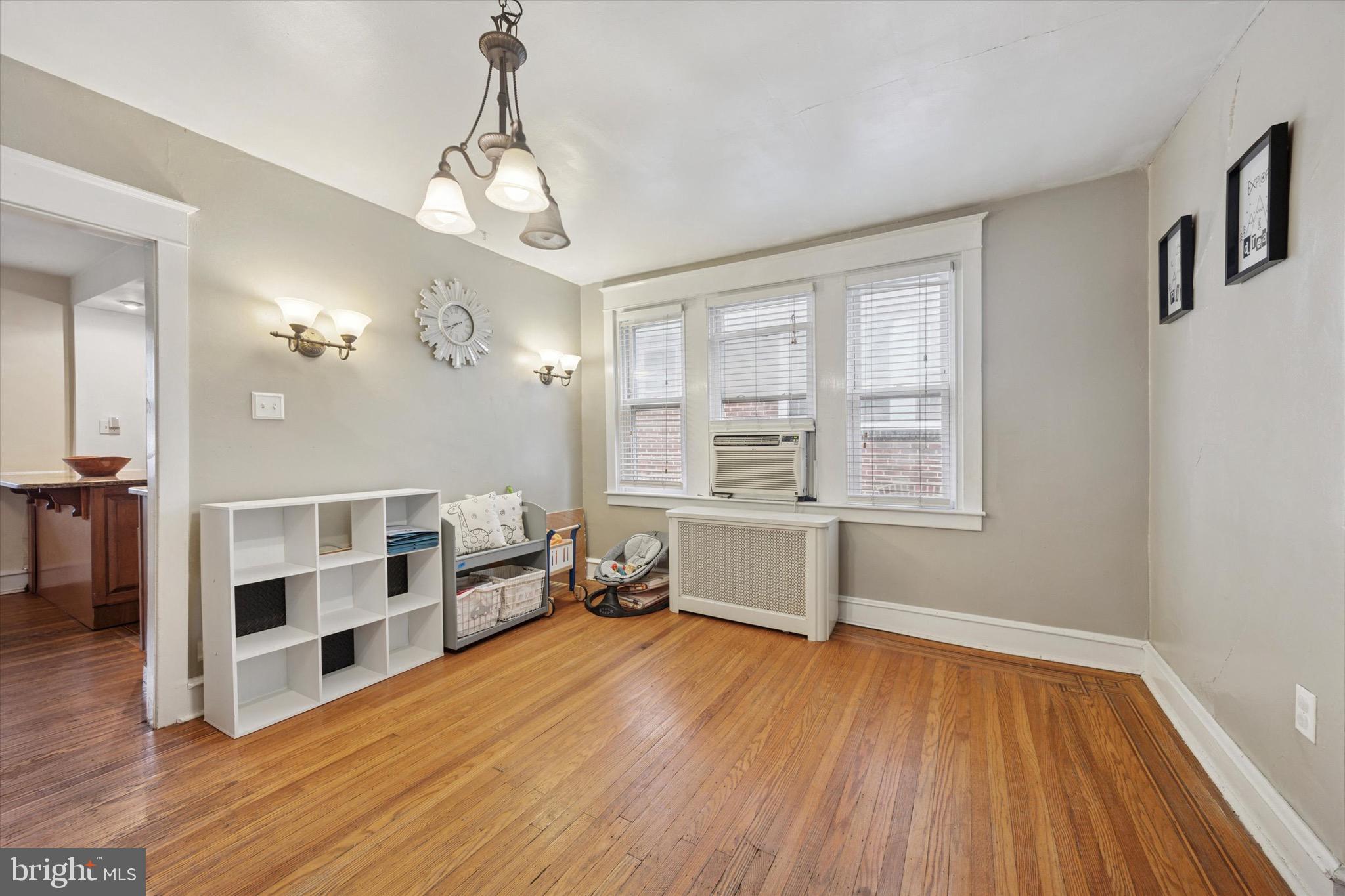 4930 State Road Drexel Hill, PA 19026 - Photo 5 of 18 a view of a room with wooden floor and windows