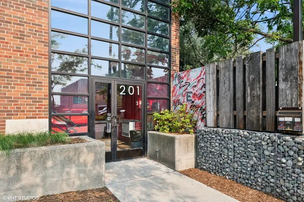 a building with glass door and outdoor space