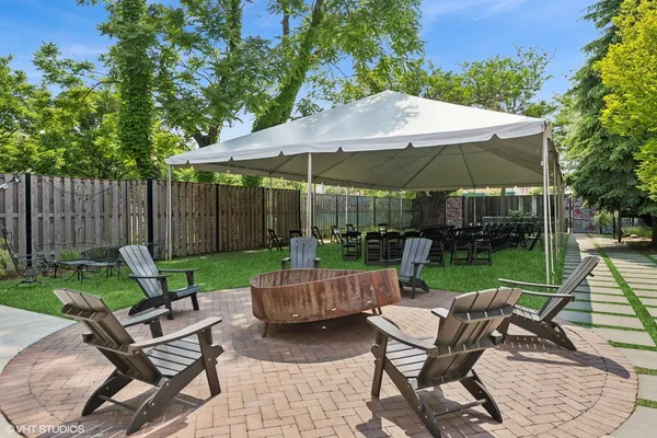 a view of a two chairs in patio
