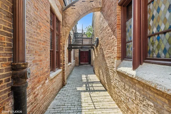 a view of a pathway both side of building