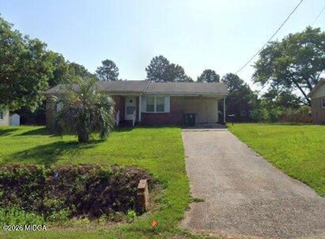 2128 Taylors Mill Road Fort Valley, GA 31030 - Photo 2 of 2 a front view of house with yard and green space