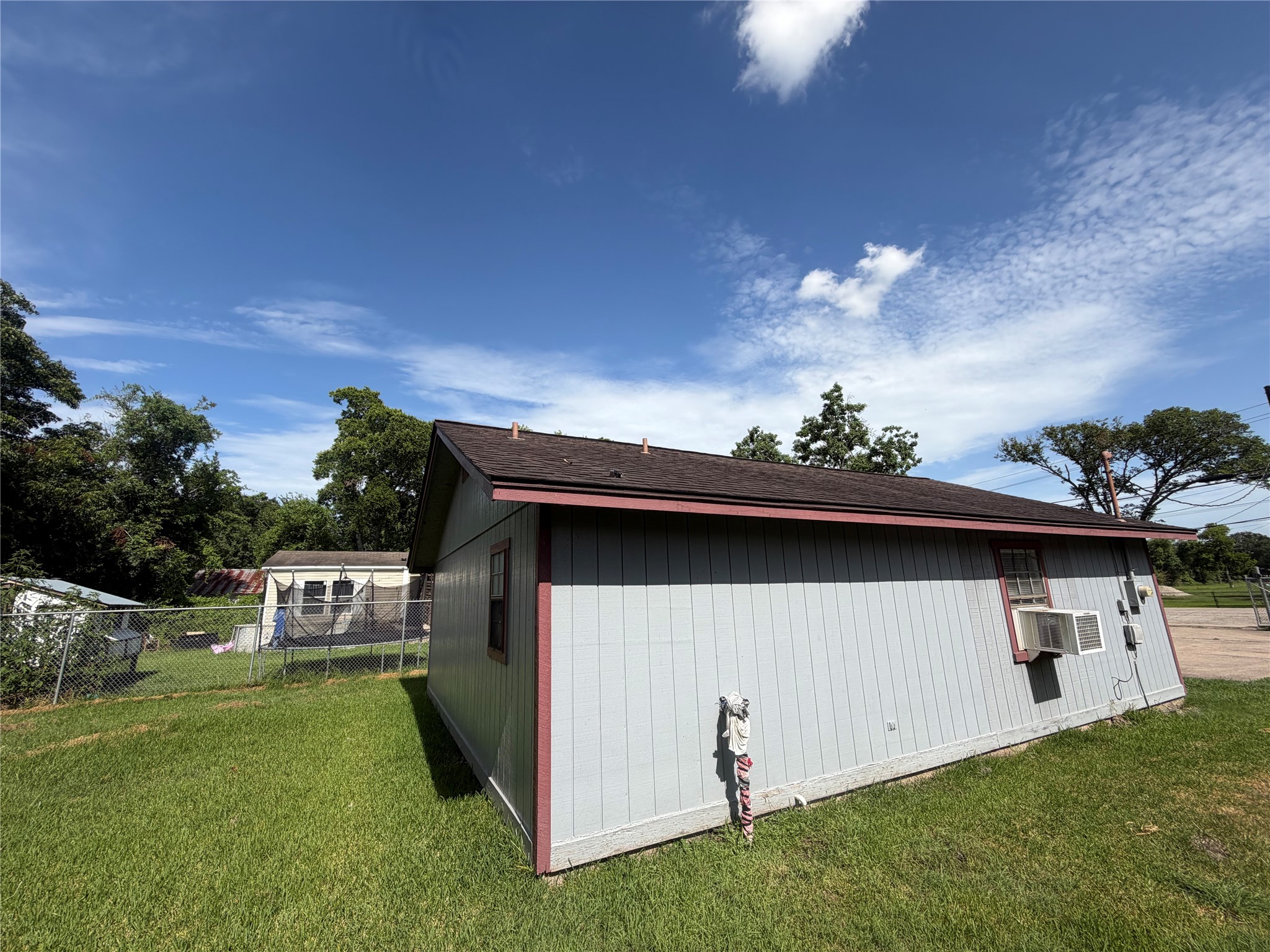 516 Battlebell Road Highlands, TX 77562 - Photo 10 of 17 a view of a back yard of the house with a yard