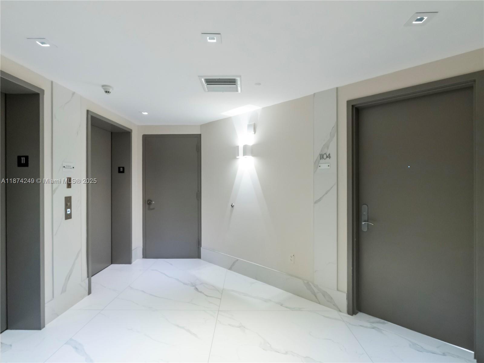 400 Alton Road, Unit 1104 Miami Beach, FL 33139 - Photo 17 of 27 a view of a big room with closet and windows