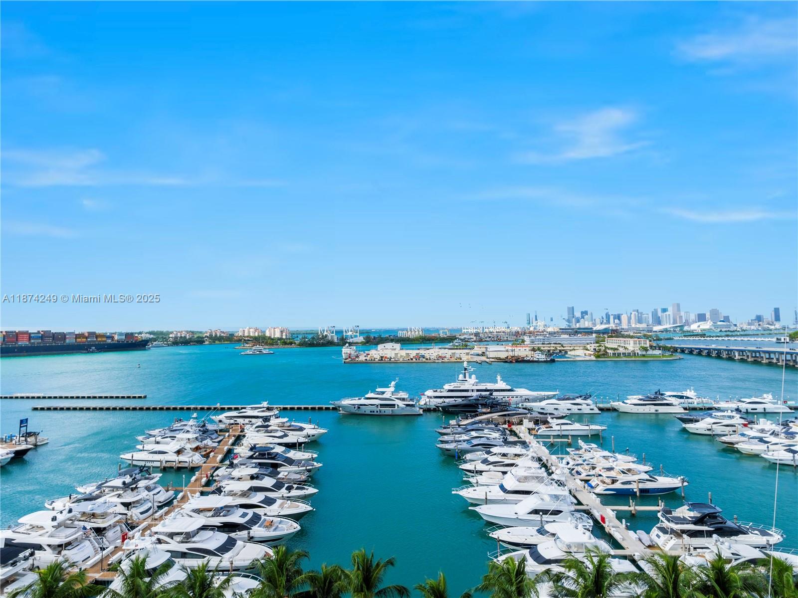 400 Alton Road, Unit 1104 Miami Beach, FL 33139 - Photo 18 of 27 an aerial view of a city with a lake view