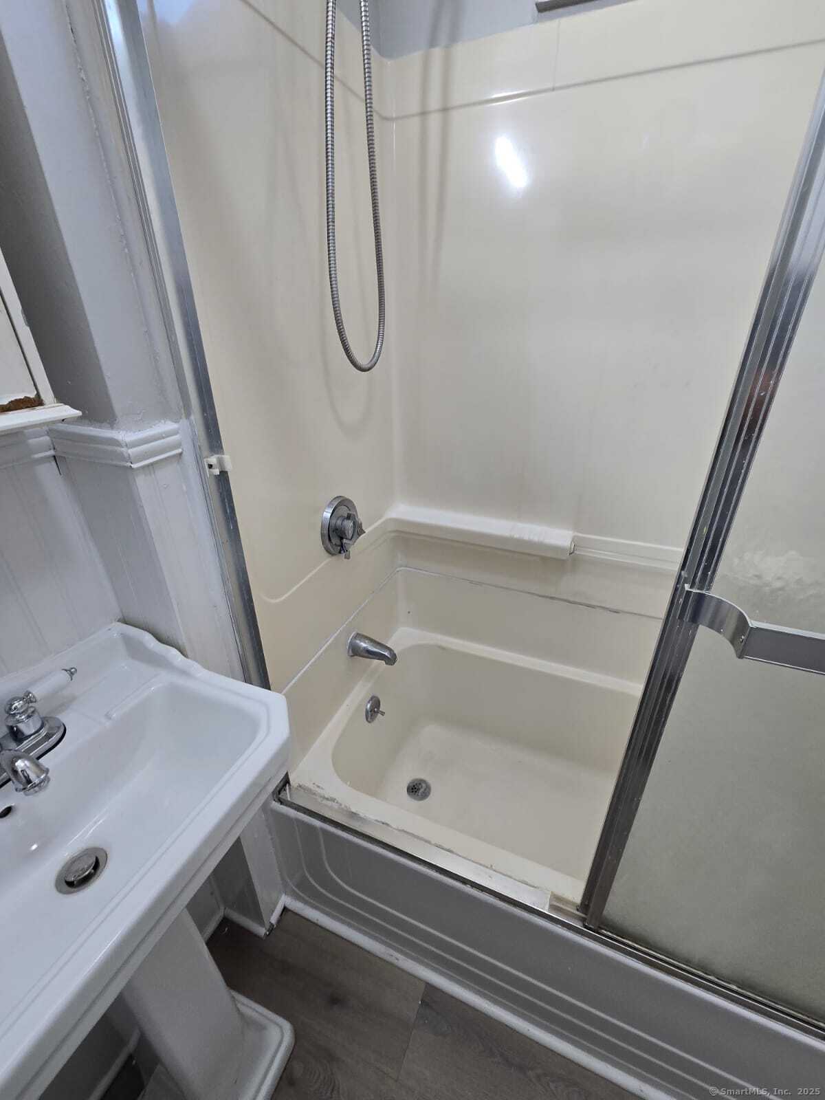 121 2nd Avenue West Haven, CT 06516 - Photo 11 of 17 a bathroom with a sink and a shower