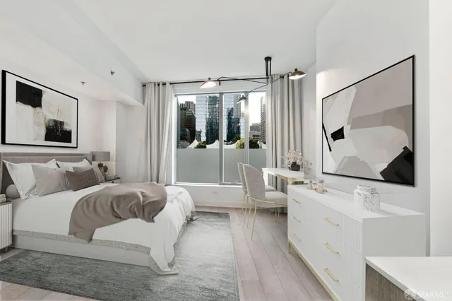 a en suite bathroom with a double vanity sink a mirror and shower