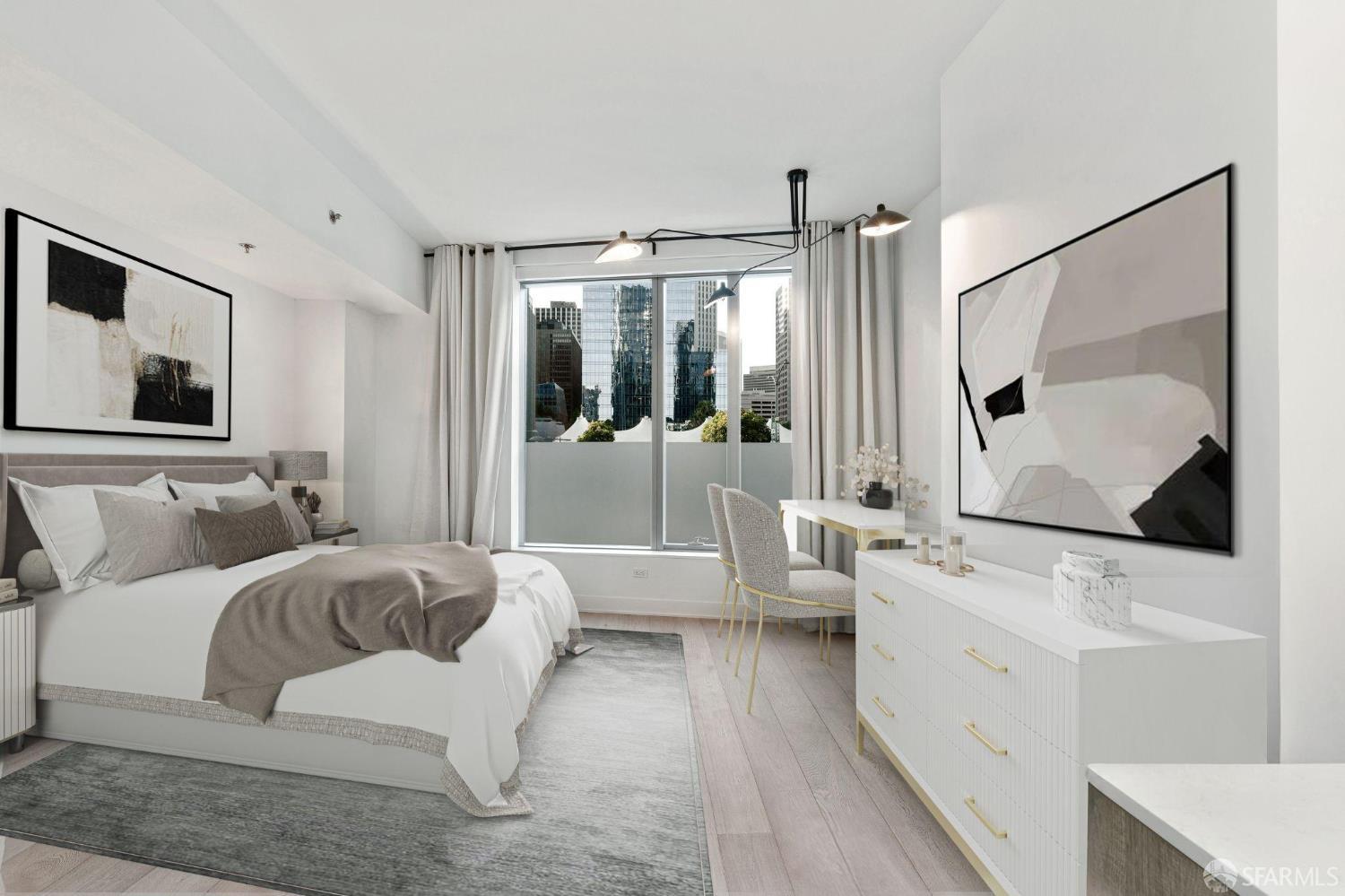 a en suite bathroom with a double vanity sink a mirror and shower