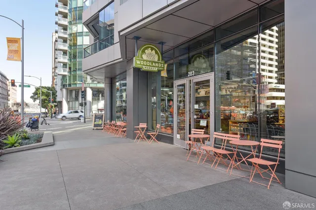 a view of a building with sitting area