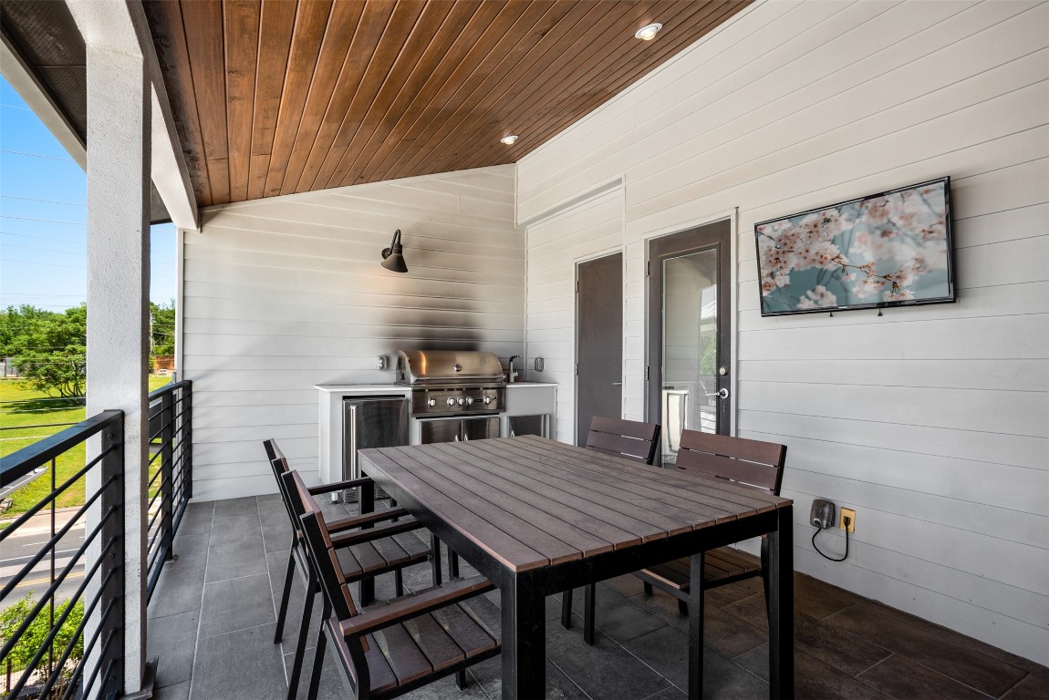 1009 East 12th Street Austin, TX 78702 - Photo 24 of 27 a view of a dining room with furniture and wooden floor