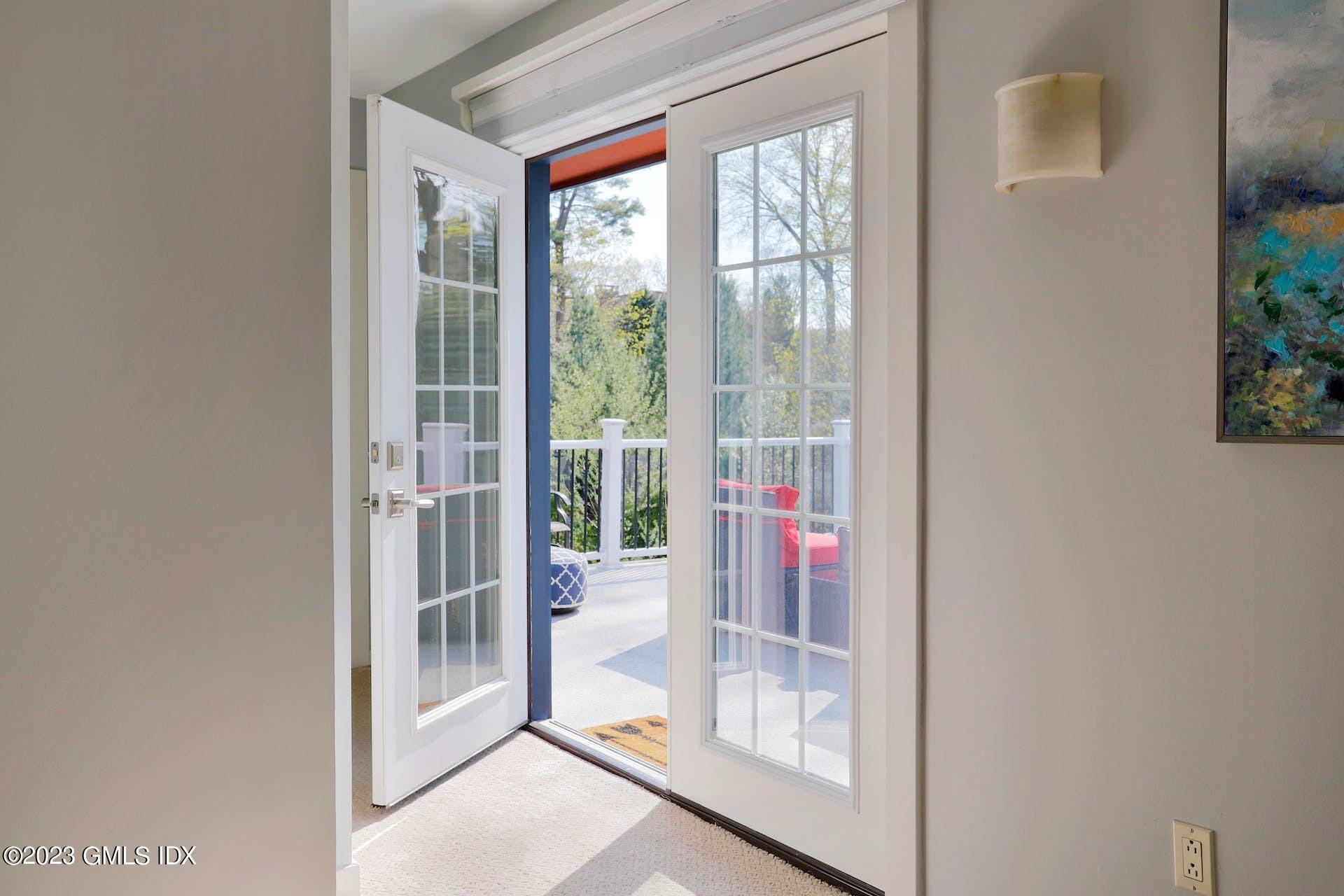 62 Morningside Drive Greenwich, CT 06830 - Photo 19 of 31 a view of a room that has a glass door
