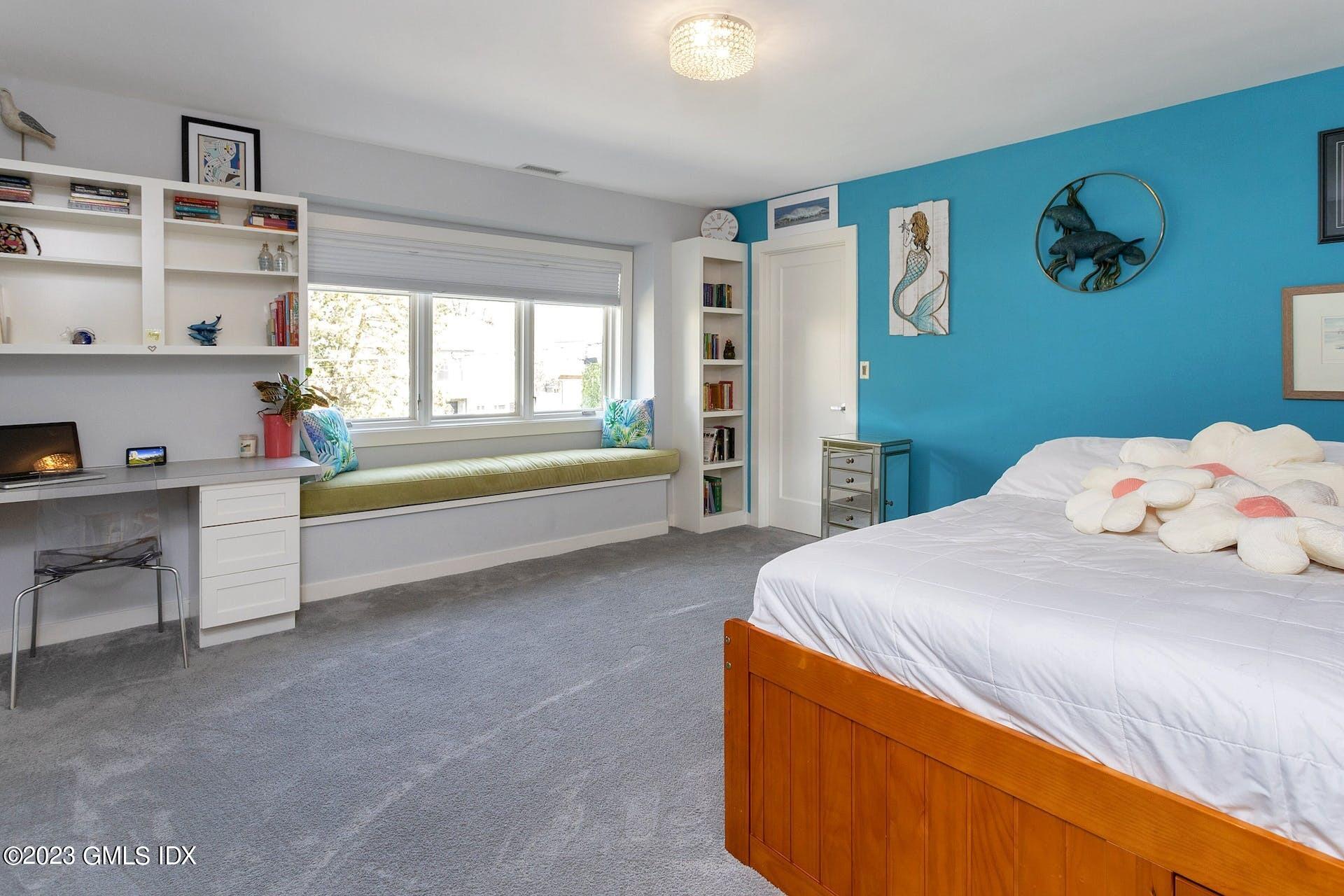 62 Morningside Drive Greenwich, CT 06830 - Photo 24 of 31 a bedroom with a bed and a dresser in it