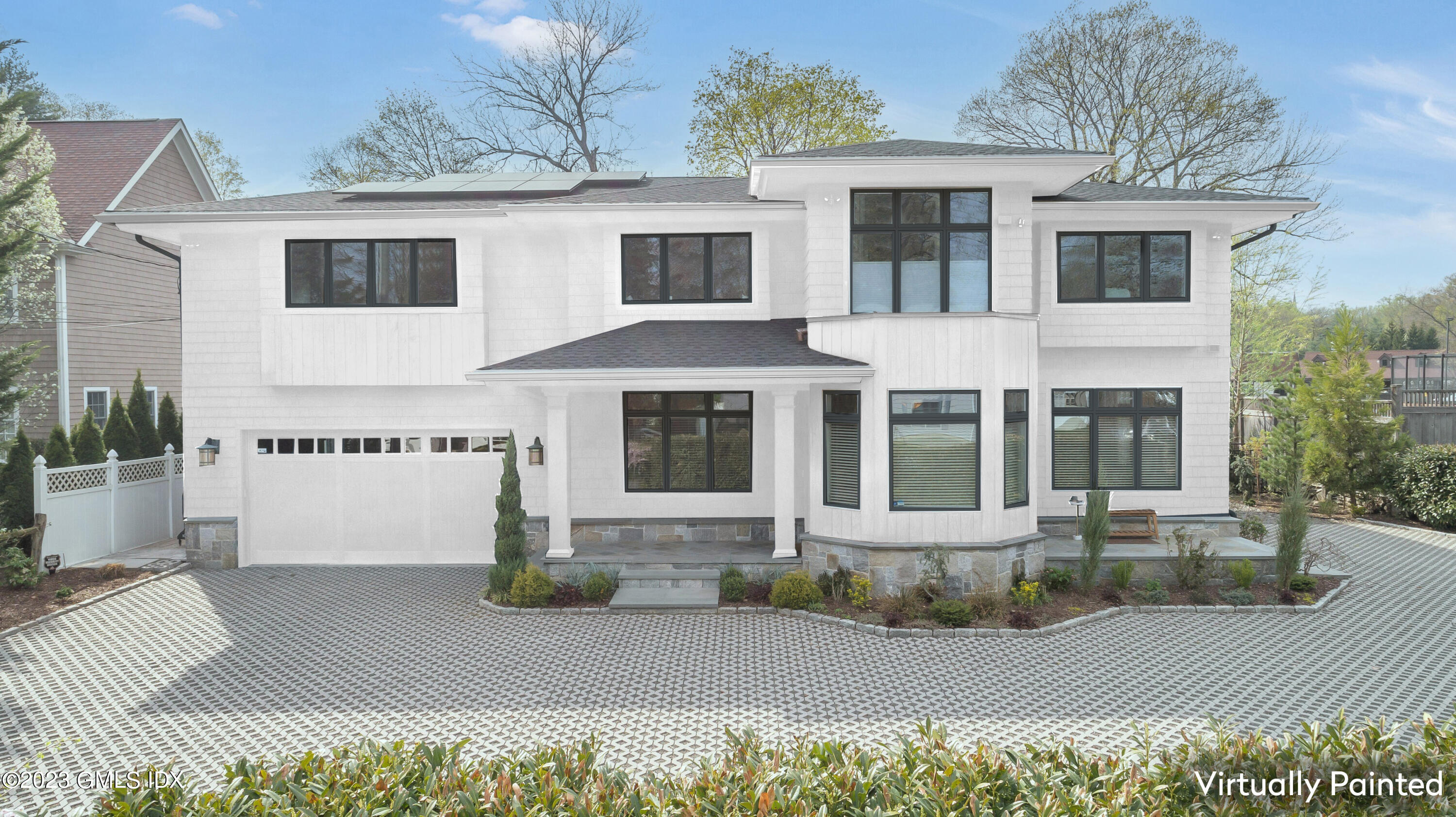 62 Morningside Drive Greenwich, CT 06830 - Photo 3 of 31 a front view of a house with garden