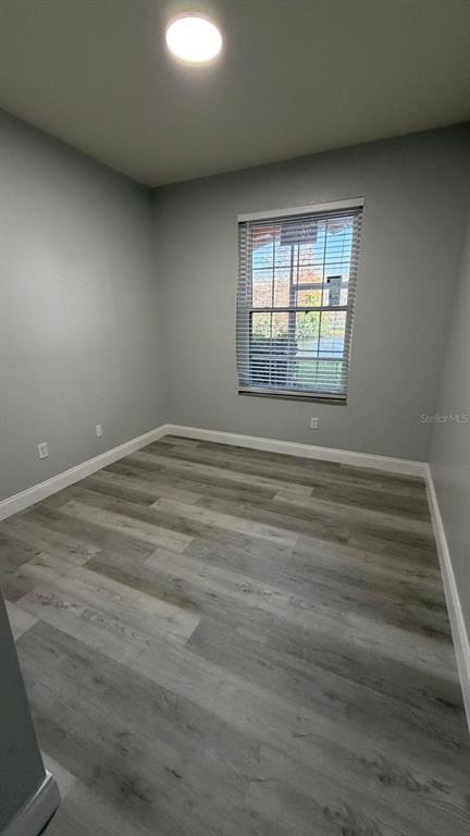 13584 Turtle Marsh Loop, Unit 113 Orlando, FL 32837 - Photo 14 of 29 a view of an empty room with a window