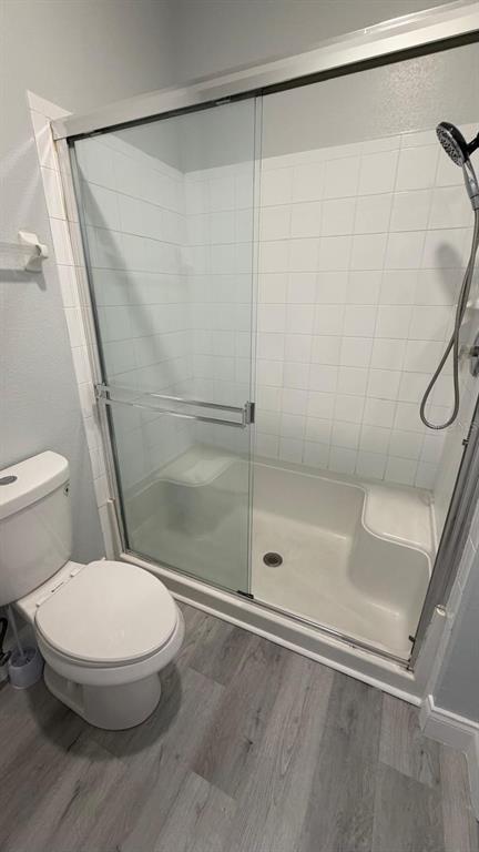 13584 Turtle Marsh Loop, Unit 113 Orlando, FL 32837 - Photo 15 of 29 a bathroom with a toilet and a shower