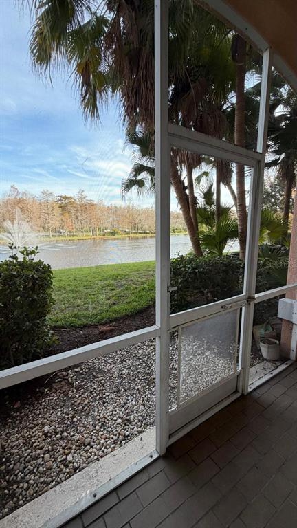 13584 Turtle Marsh Loop, Unit 113 Orlando, FL 32837 - Photo 25 of 29 a view of roof with wooden deck