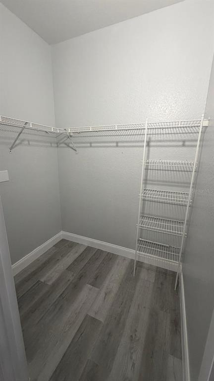 13584 Turtle Marsh Loop, Unit 113 Orlando, FL 32837 - Photo 28 of 29 a view of a room with racks on the wall