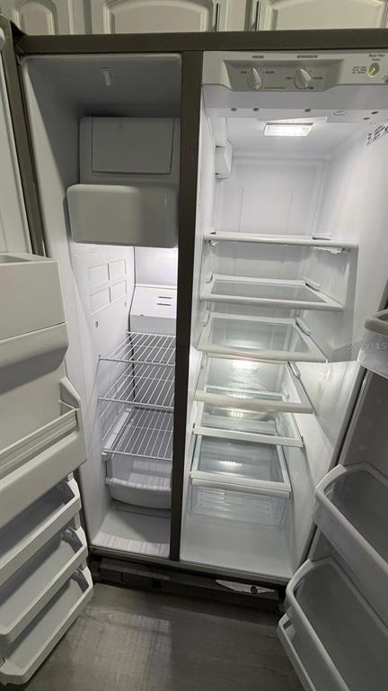 13584 Turtle Marsh Loop, Unit 113 Orlando, FL 32837 - Photo 4 of 29 a view of walk in closet with racks on the wall