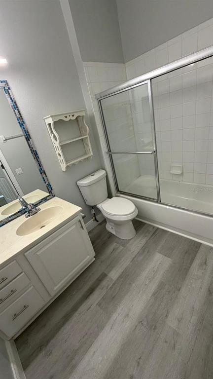 13584 Turtle Marsh Loop, Unit 113 Orlando, FL 32837 - Photo 9 of 29 a bathroom with a toilet and a shower