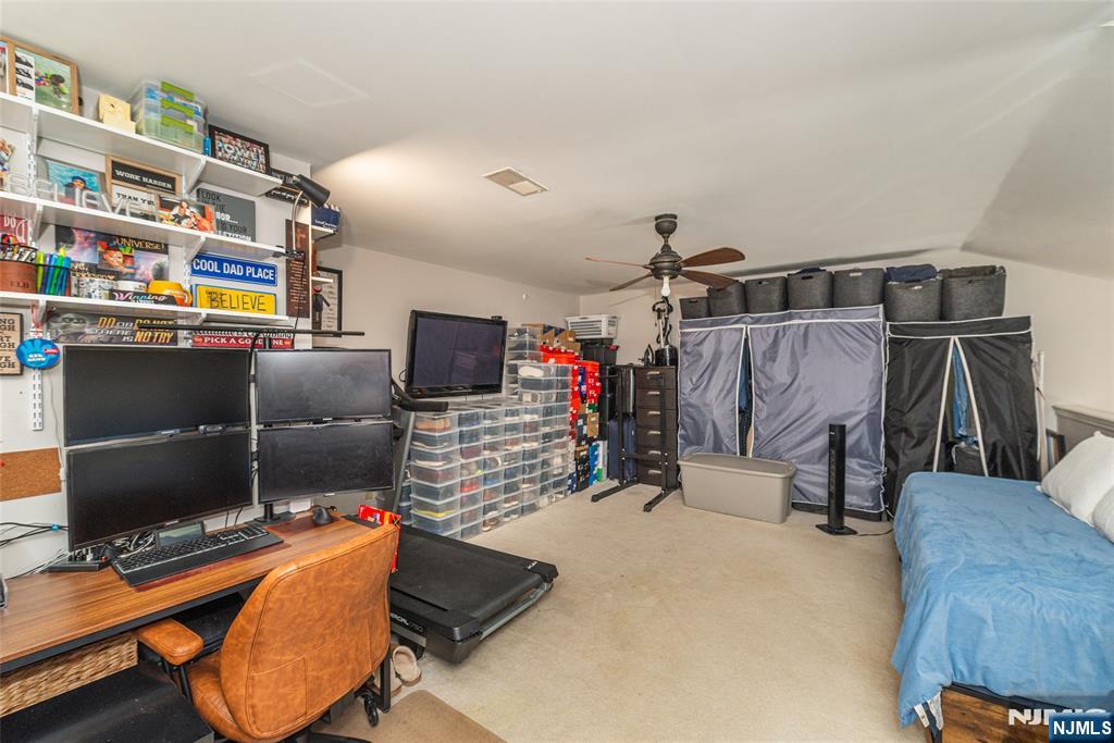 454 Cambridge Drive Butler, NJ 07405 - Photo 14 of 38 a room with musical instruments