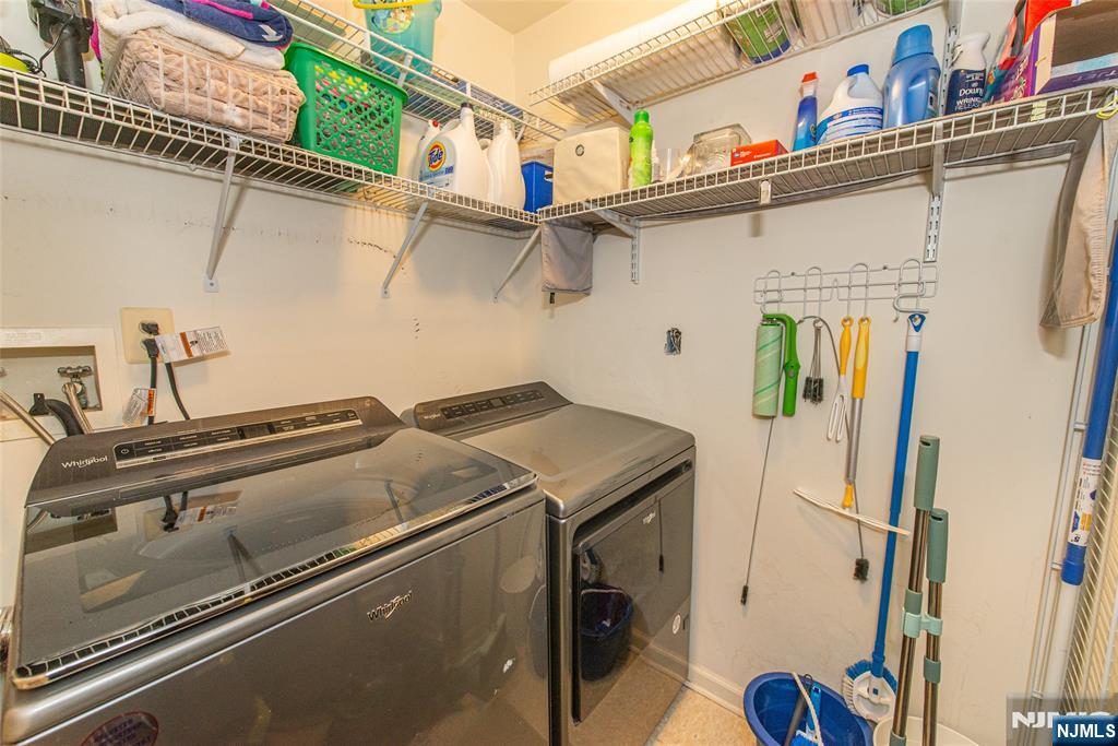 454 Cambridge Drive Butler, NJ 07405 - Photo 19 of 38 a utility room with dryer and washer