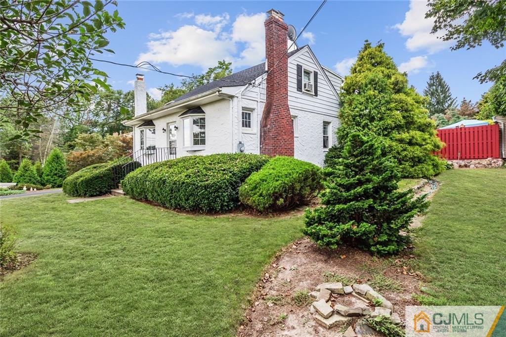 52 Cottrell Road Old Bridge, NJ 07747 - Photo 3 of 23 a view of a house with a yard and potted plants