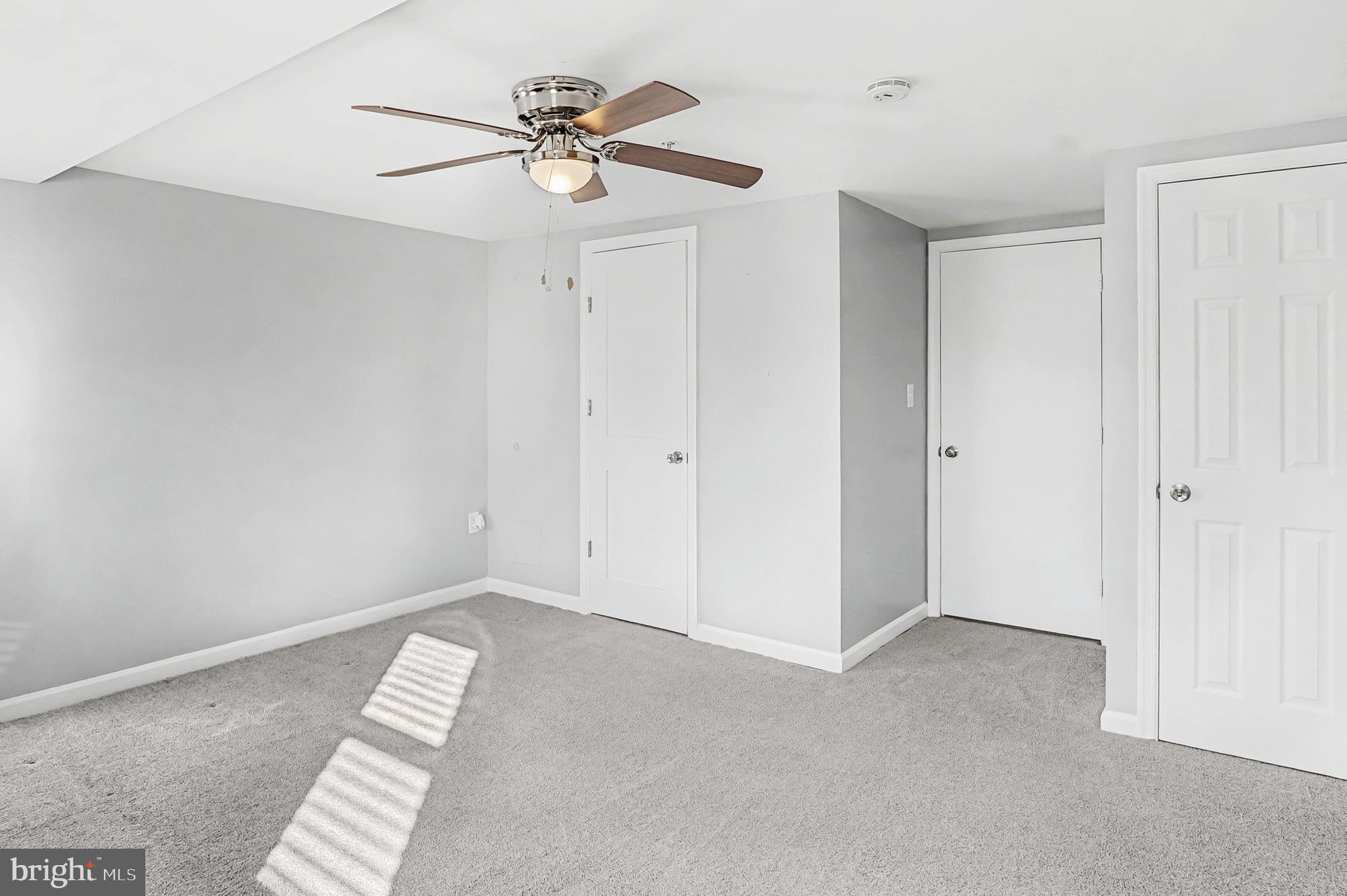 1032 North Broadway Baltimore, MD 21205 - Photo 19 of 28 a view of room with window and ceiling fan