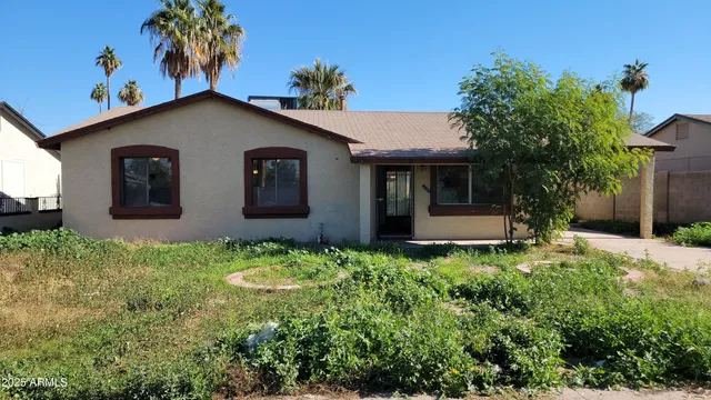 a house view with a garden space