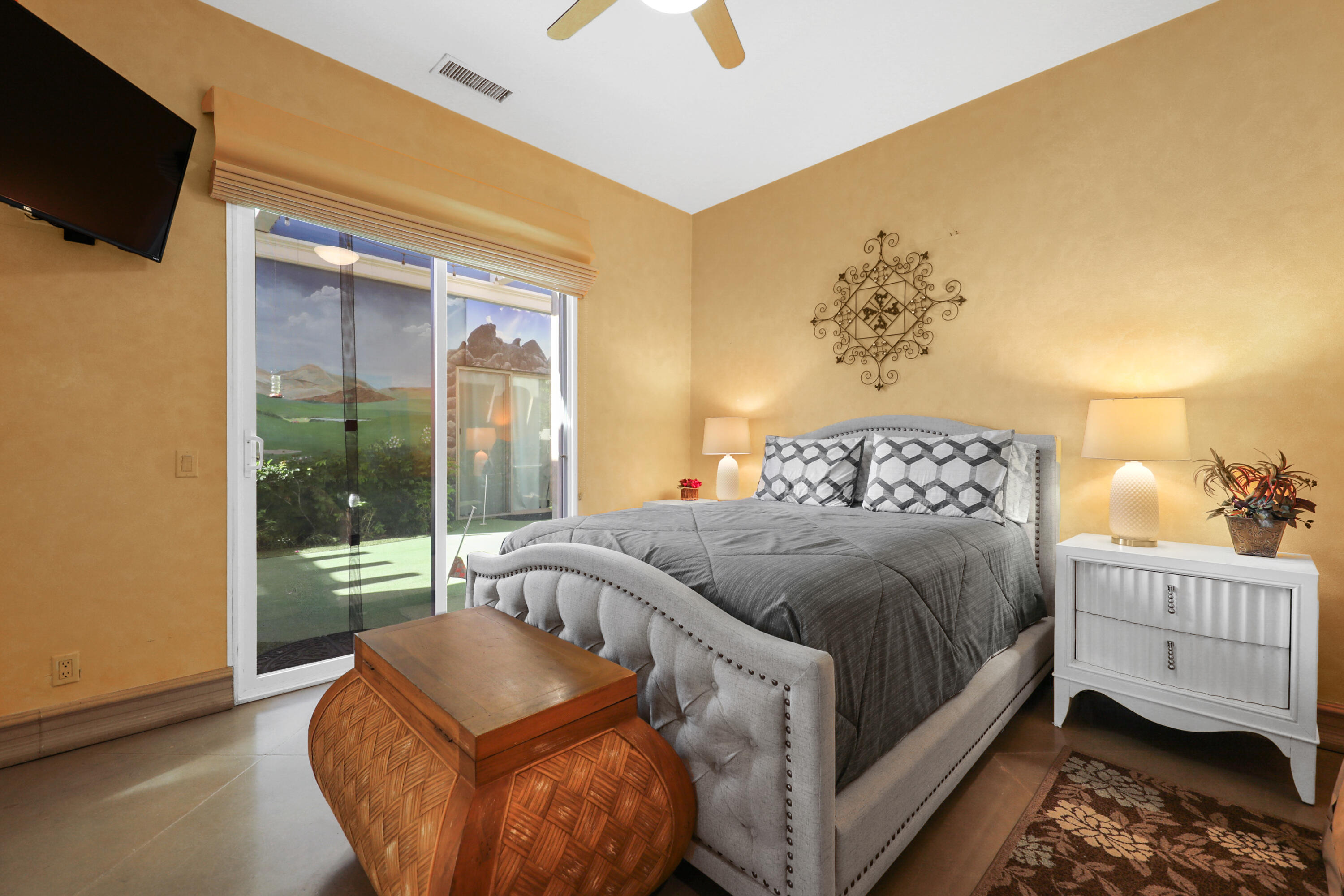 78680 Ave Tujunga La Quinta, CA 92253 - Photo 15 of 41 a bedroom with a bed and a window