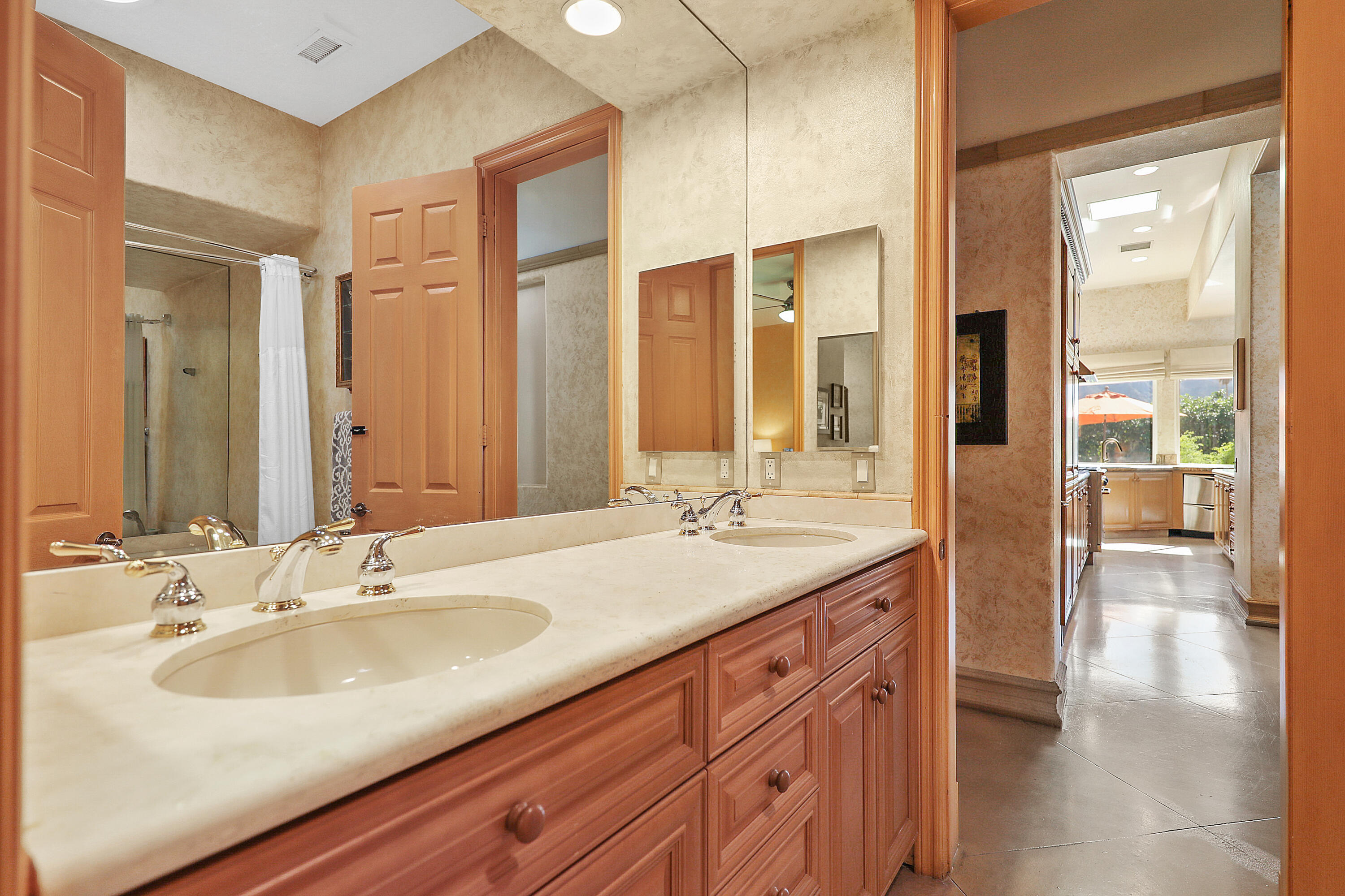78680 Ave Tujunga La Quinta, CA 92253 - Photo 19 of 41 a bathroom with a sink double vanity and a mirror