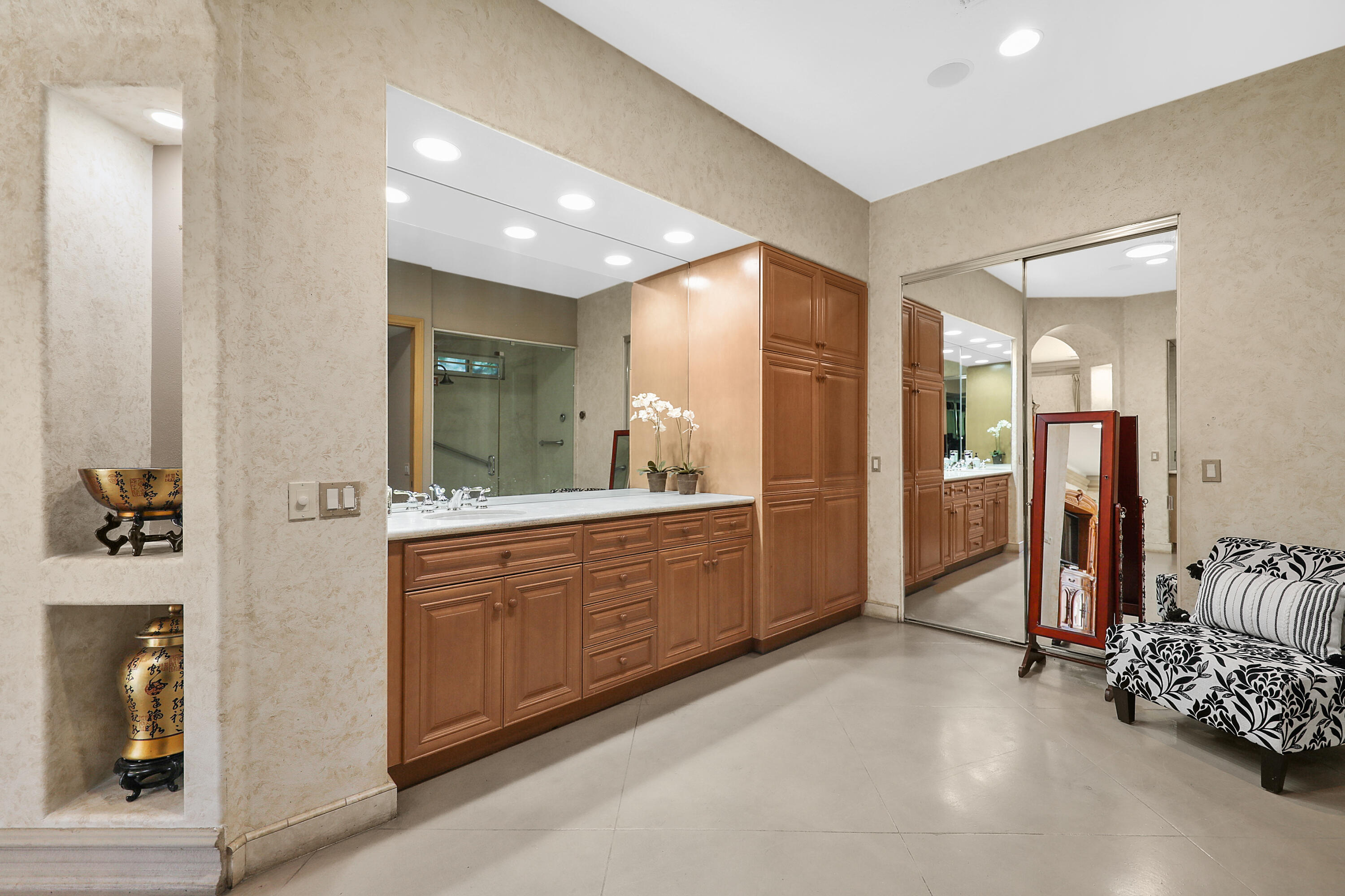 78680 Ave Tujunga La Quinta, CA 92253 - Photo 23 of 41 a bathroom with a double vanity sink and mirror