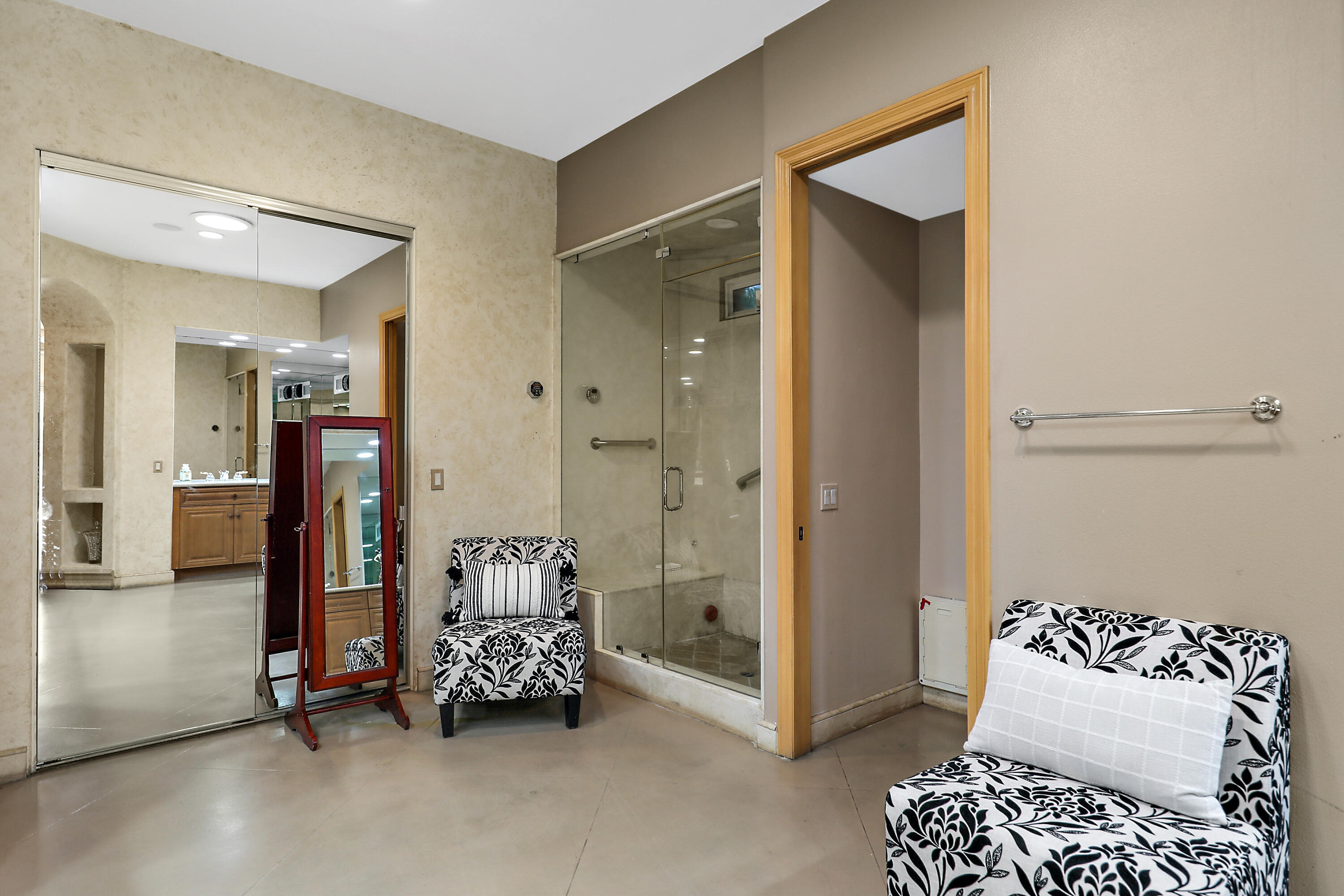 78680 Ave Tujunga La Quinta, CA 92253 - Photo 24 of 41 a bedroom with a bed and a couch