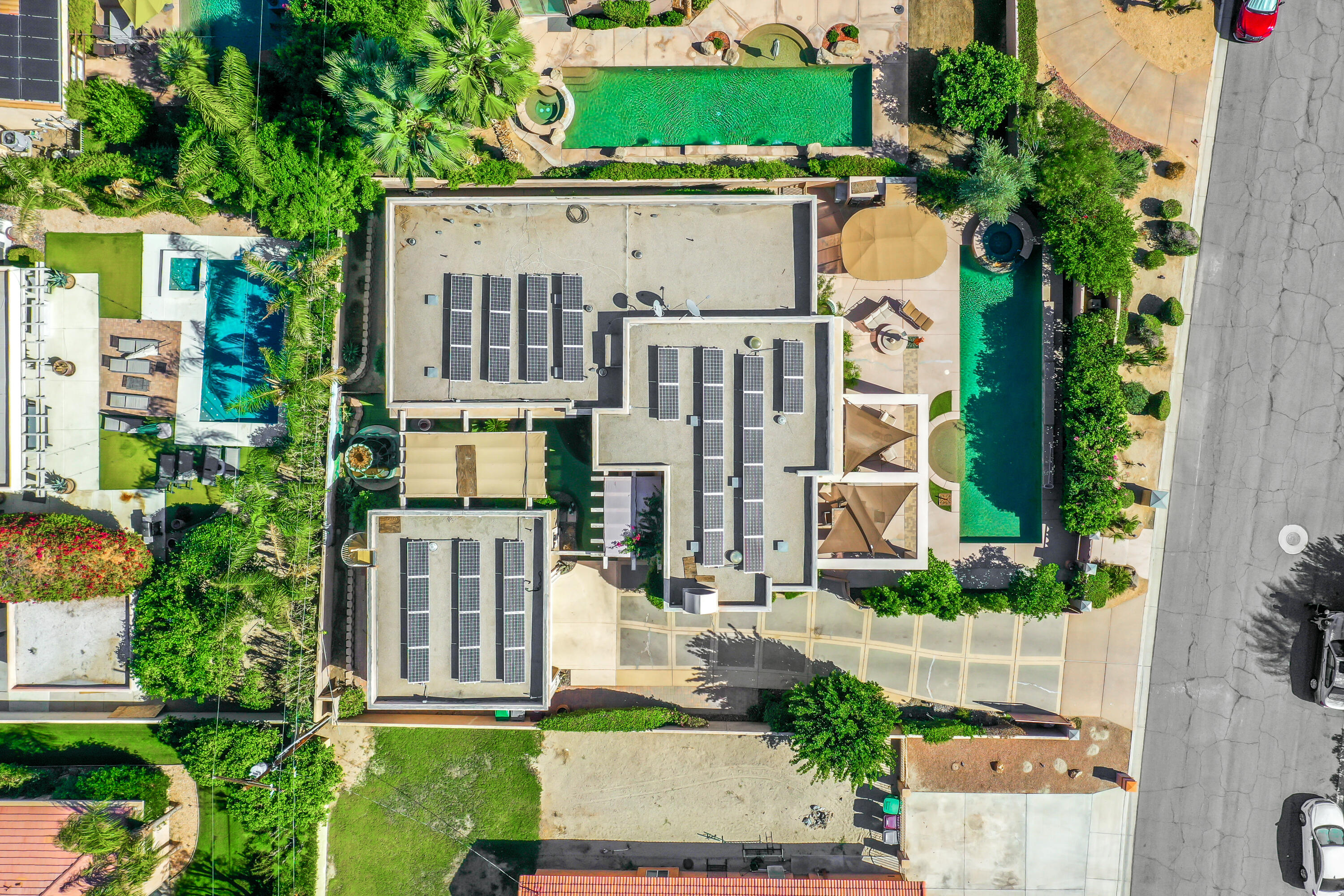 78680 Ave Tujunga La Quinta, CA 92253 - Photo 40 of 41 aerial view of a house with a yard and potted plants